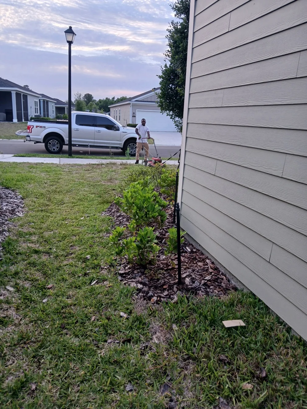 Before lawn and landscape bed care: a clean finish along the side yard