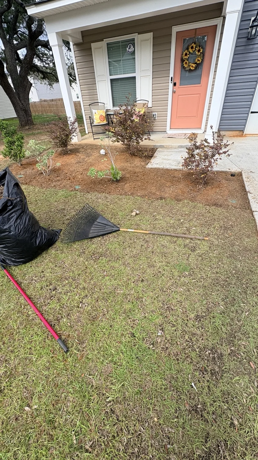 Before mulch installation: mulch along the porch