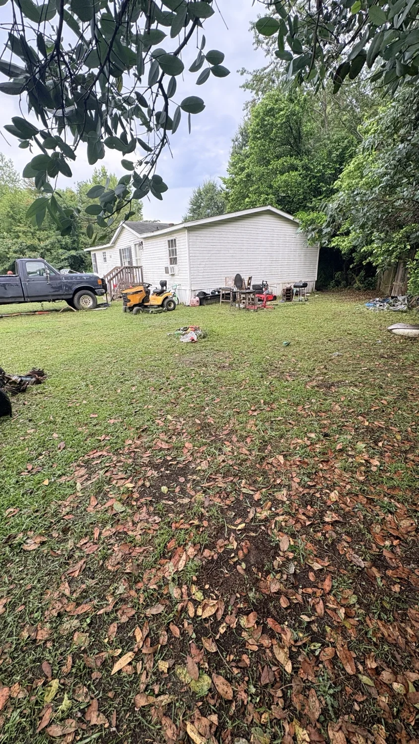 After lawn mowing: a tidy finish beside the home by Fixed by Hicks