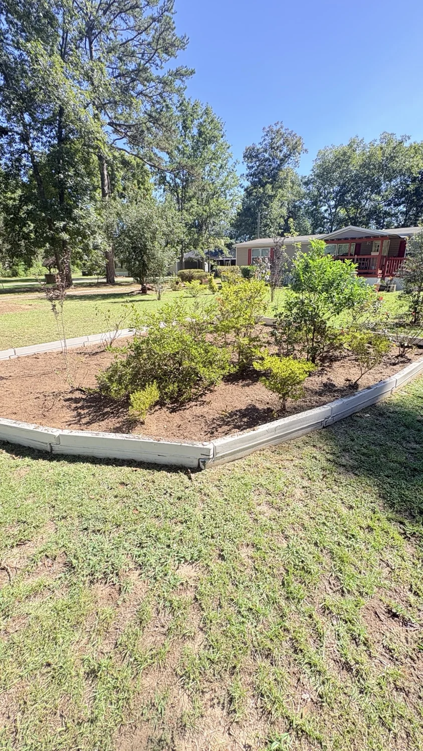 After landscape bed cleanup: finished work by Fixed by Hicks